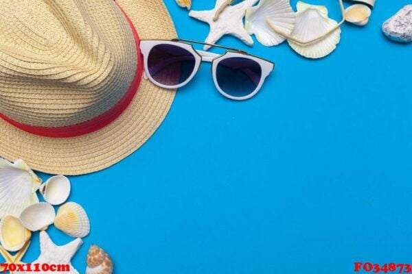 beachwear and accessories on a blue background