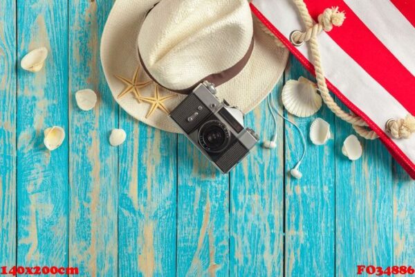 beach accessories on the blue wooden board