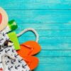 beach accessories on wooden table.