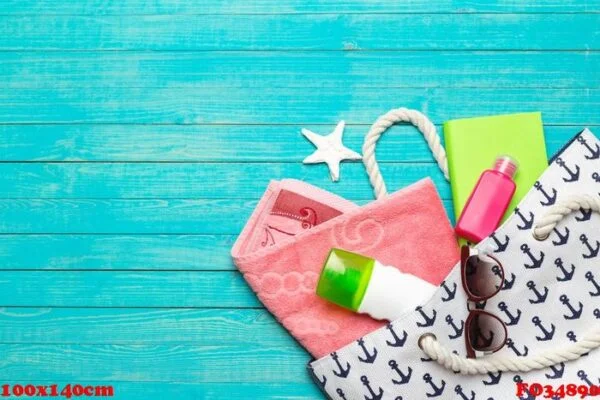 beach accessories on wooden table.