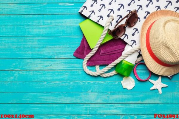 beach accessories on wooden table.