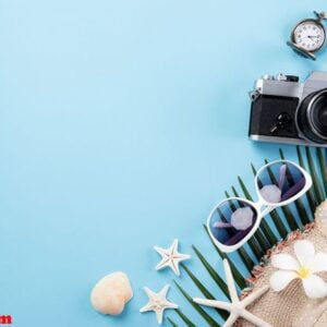 beach accessories retro film camera, sunglasses, airplane, starf