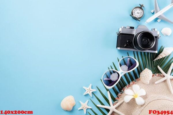 beach accessories retro film camera, sunglasses, airplane, starf