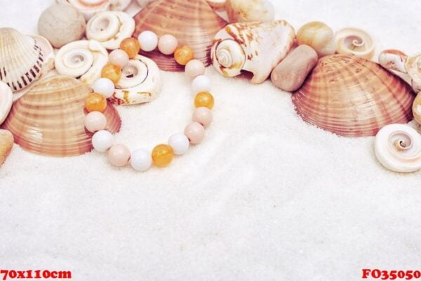 womens bracelet made of beads, seashells, star and stones on san