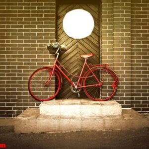 vintage retro old red bike on the street.