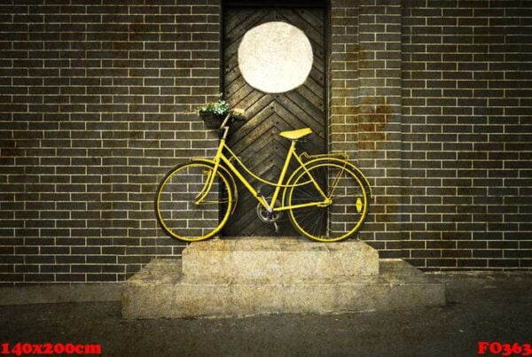 vintage retro old yellow bike on the street.