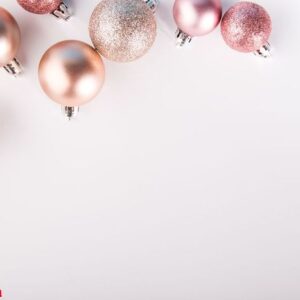 shining pink baubles on white