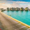 beautiful water villas in tropical maldives island at the sunris