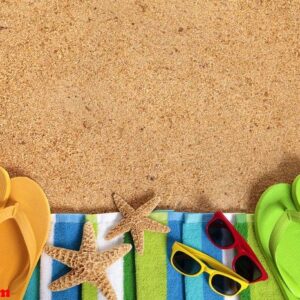 beach background with sunglasses and flip flops