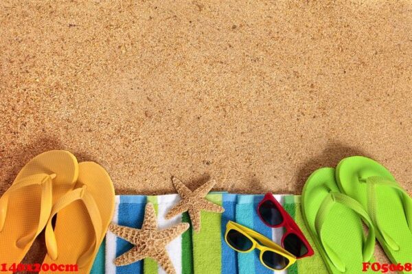 beach background with sunglasses and flip flops