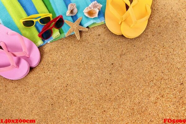 beach background with sunglasses and flip flops