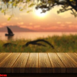 wooden table with defocussed image of boat on a lake