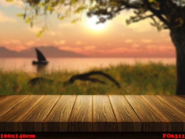 wooden table with defocussed image of boat on a lake