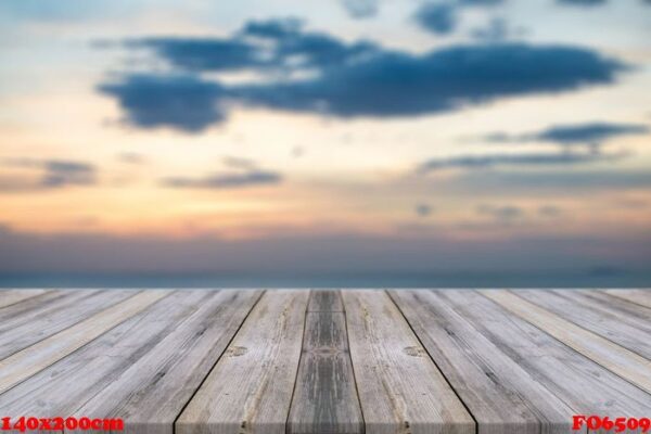 vintage wooden board empty table in front of sunset background.