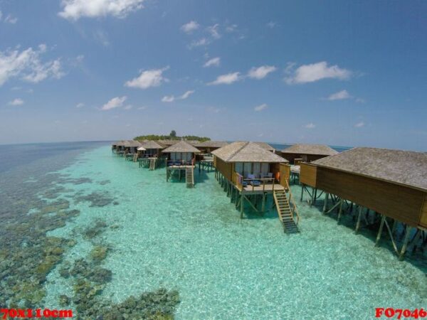 aerial view of a tropical island in turquoise water. luxurious o