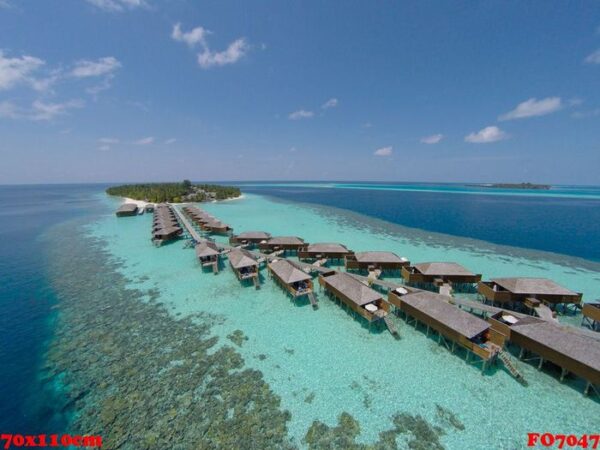 aerial view of a tropical island in turquoise water. luxurious o