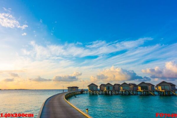 beautiful sunrise with water villas in tropical maldives islan