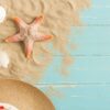 sand and shells on the wooden floor of the blue,summer concept