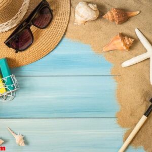 sand and shells on the wooden floor of the blue,summer concept