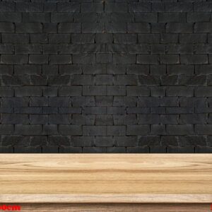 empty wooden table top at black brick wall,template mock up for