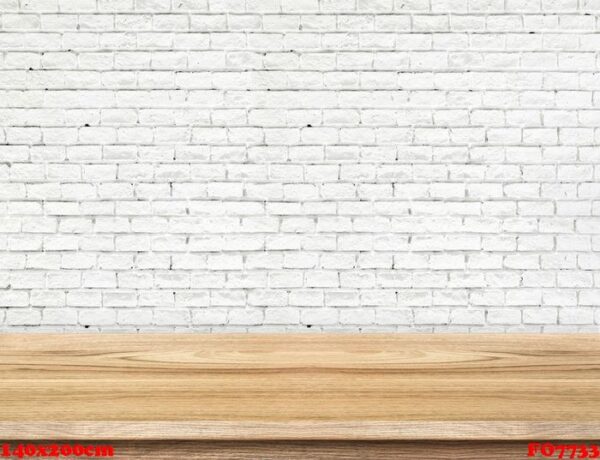 empty wood table and white brick wall in background. product dis