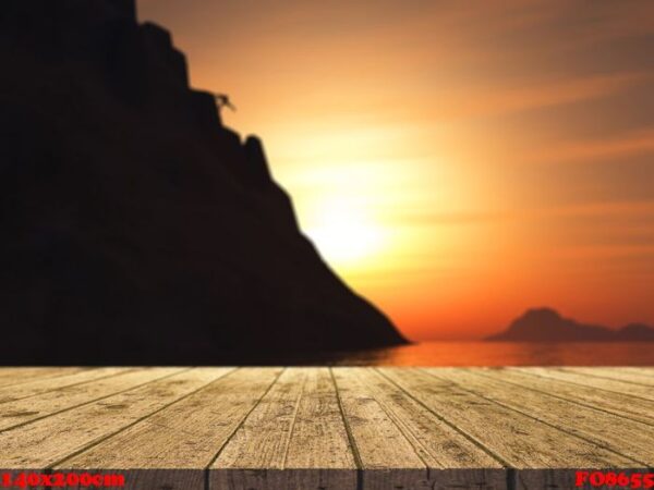 3d wooden table looking out to a rock climber climbing a large m