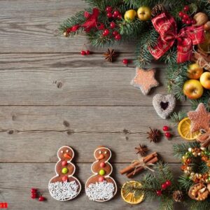 christmas wooden background with traditional ornaments, gingerbr