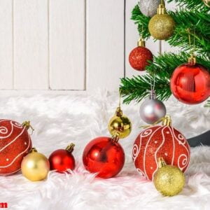 christmas tree and ornaments with gifts boxes