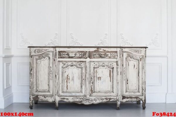 ancient white commode bureau with paint peeled off on luxury wall design bas relief stucco mouldings roccoco elements