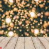 wood table top with abstract christmas holiday festive bokeh lig