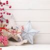 christmas decor on the wooden white background.