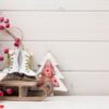 christmas decor on the wooden white background.