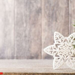 christmas fir branch and decor, on the wooden background.