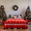 beautiful holdiay decorated room with christmas tree with presents under it