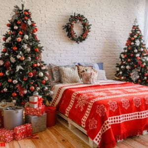 beautiful holdiay decorated room with christmas tree with presents under it