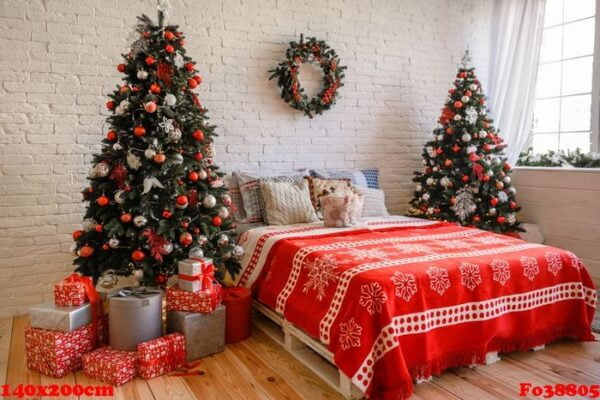 beautiful holdiay decorated room with christmas tree with presents under it