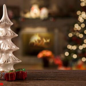 christmas tree decoration on the table on a christmas blurry bac