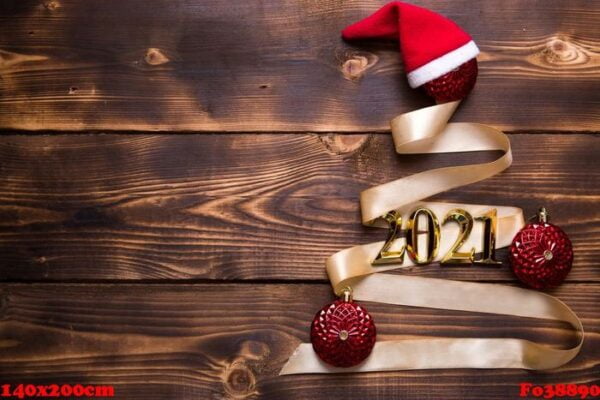 a christmas tree made of gold ribbon with the numbers 2021 is de