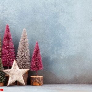 colorful christmas tree on blue background.