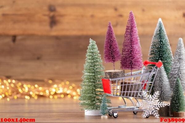 colorful christmas tree on wooden, bokeh background.