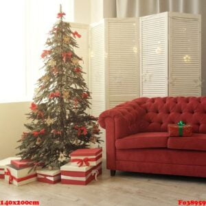 gift boxes under decorated christmas tree and red box with green riboon on red sofa