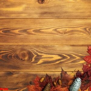 maple leaves on the wooden board. autumn background