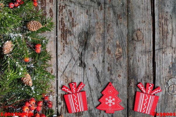 merry christmas and happy holidays greeting card, frame, banner. new year. happy new year card with snow on wooden background. winter xmas holiday theme. flat lay.