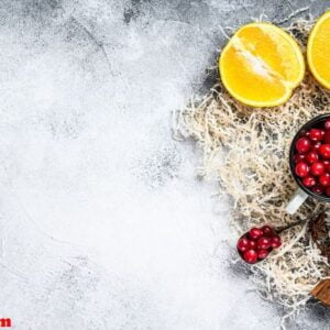 mulled wine recipe. ingredients with cranberries, oranges, cinna