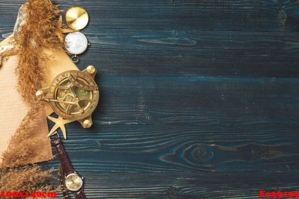 travel items on wooden table.