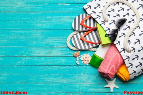 beach accessories on wooden table.