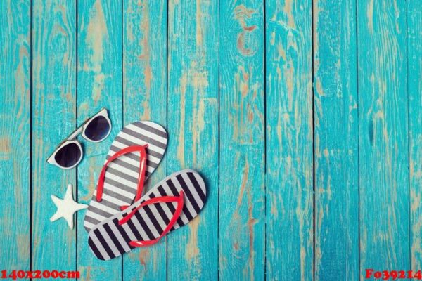 flip flops on color wooden background