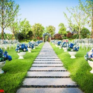 beautiful wedding flower arrangement of seats along the aisle