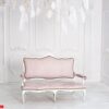 classical white interior with pink sofa.