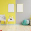 mock up poster frame in children room on yellow illuminating and ultimate gray wall background.